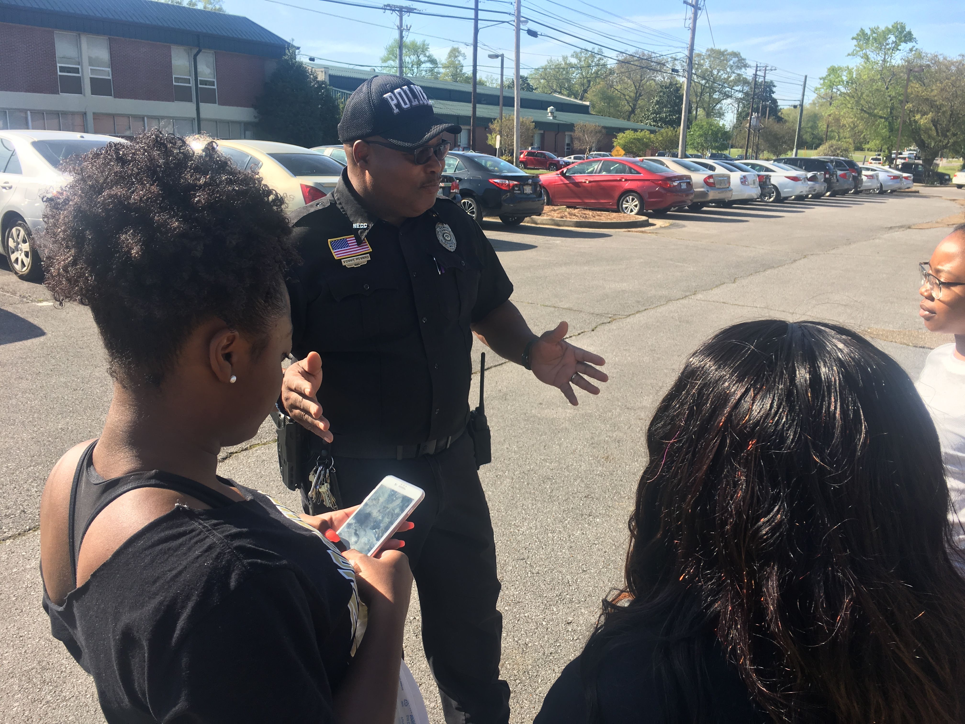 Photo of Campus Police talking with Students